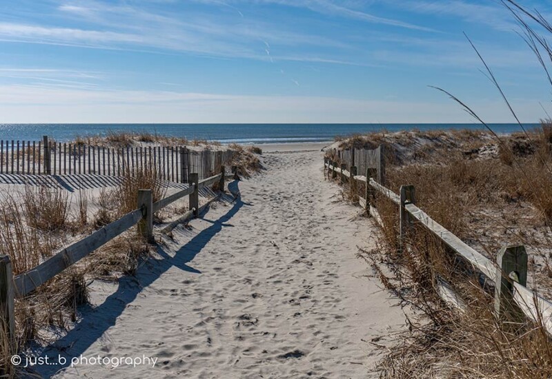sandy beach path to ocean in winter