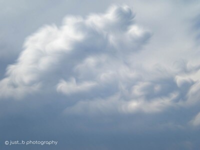 Dark sky and soft clouds with specialized filters for wispy effects.