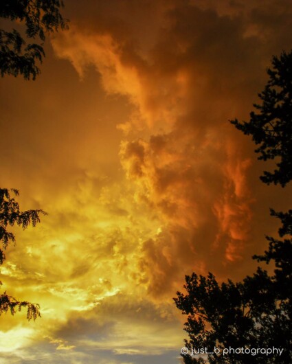 Stormy, fiery sunset sky over Santa Fe, NM.